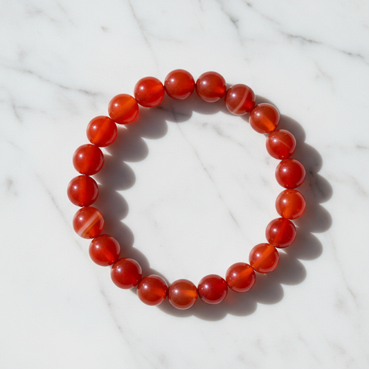 Natural Carnelian Bracelet - overhead flat lay on white marble