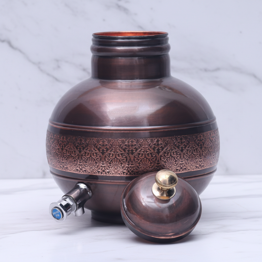 Pure Copper Antique Engraved Ghada Pot Dispenser with lid off on white marble