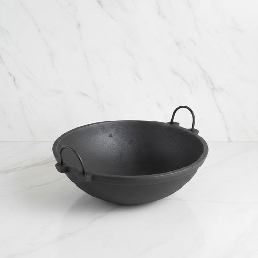 Large Cast Iron Kadai on white marble background - Face of Norway