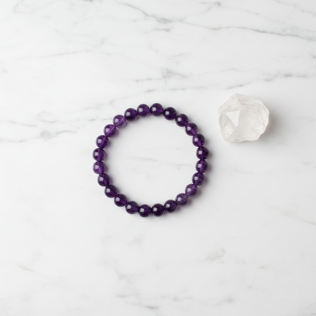 Amethyst bracelet flat lay with crystal