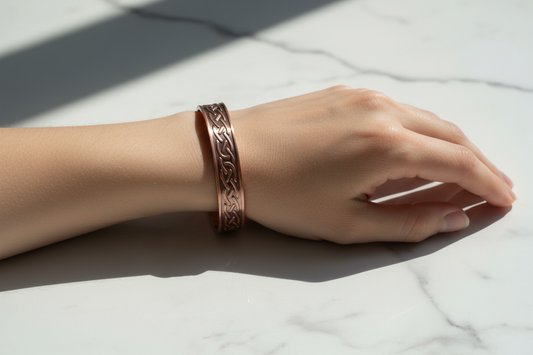 Copper water ripple bracelet on woman's wrist