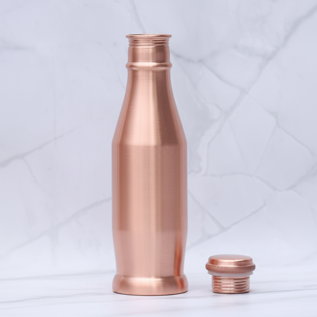 Pure copper water bottle plain design close-up on white marble